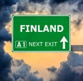 FINLAND road sign against clear blue sky Royalty Free Stock Photo