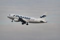 Finnair Airbus A319-112 jet leaving Zurich in Switzerland