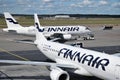 Finnair airplanes waiting for departure in Helsinki Royalty Free Stock Photo