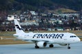 Finnair jet taxiing at Innsbruck Airport INN