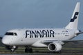 Finnair taxi on runway, Embraier 190 Royalty Free Stock Photo