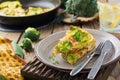 Finnis, omelet with broccoli, farel, potatoes and onions. Rustic style.