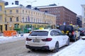 Finnish car with sign Taxi waits for passengers on street of Helsinki city, public transport concept used to transport passengers