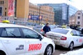 Finnish car with sign Taxi waits for passengers on street of Helsinki city, public transport concept used to transport passengers