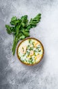 Finnish Creamy Fish Soup with Salmon and Potatoes. Gray background, top view