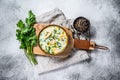 Finnish Creamy Fish Soup with Salmon and Potatoes. Gray background, top view