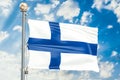 Finnish flag waving in blue cloudy sky, 3D rendering Royalty Free Stock Photo