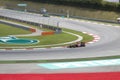 Kimi Raikkonen enters turn 1 at Malaysian F1 GP