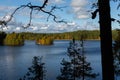 Finnish Lake landscape from Teijo National Park in autumn with dark silhouette of a pine tree trunk