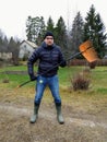 Finnish man preparing to go in the forest to rake leaves