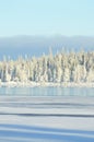 Finnish winter. Crystal clear cold winter day. Lake Porontima, Kuusamo.