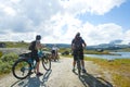 Tourists biking in Finse