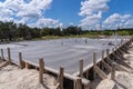 Drying smooth oncrete for slab foundation in Texas Royalty Free Stock Photo