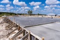 Drying smooth oncrete for slab foundation in Texas Royalty Free Stock Photo