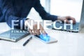 Fintech. Financial technology text on virtual screen. Business, internet and technology concept