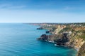 Fiolent Cape Crimea Black Sea. Blue azure seaside with corals sand and stones