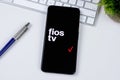 Fios TV app logo on a smartphone screen