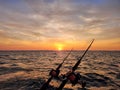 Fishing Poles and Lake Michigan Sunrise Royalty Free Stock Photo