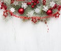 Fir branch with Christmas decorations on old wooden shabby background with copy space for text Royalty Free Stock Photo