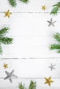 Fir branch with Christmas decorations on old wooden shabby background with copy space for text Royalty Free Stock Photo