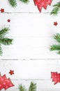 Fir branch with Christmas decorations on old wooden shabby background with copy space for text Royalty Free Stock Photo