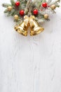 Fir branch with Christmas decorations on old wooden shabby background with copy space for text Royalty Free Stock Photo