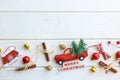 Fir branch with Christmas decorations on old wooden white background with copy space for text Royalty Free Stock Photo