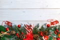 Fir branch with Christmas decorations on old wooden white background with copy space for text Royalty Free Stock Photo