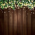 Fir Branch with Neon Lights and Snowflakes on Wooden Background. Royalty Free Stock Photo