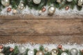 Fir branches, Christmas  and snow on wooden background, flat lay. Space for text Royalty Free Stock Photo