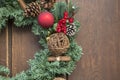 Fir Cone and Red Ball on Christmas Wreath