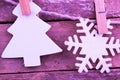 Fir tree ands snowflake toys on wooden background Royalty Free Stock Photo