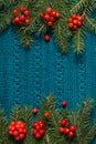 Fir tree as frame on knitted sweater background. Christmas concept. Abstract pattern. Flat lay. Royalty Free Stock Photo
