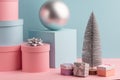 Fir tree, ball, round and square gift boxes on pink and teal background