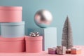 Fir tree, ball, round and square gift boxes on pink and teal background