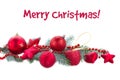 Fir tree branch and red christmas decorations Royalty Free Stock Photo