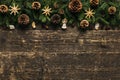 Fir Tree Branches With Pine Cones, Xmas Baubles and Decorations On Wooden Background, Festive Concept With Copy Space Royalty Free Stock Photo