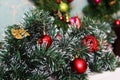 Fir-tree with Christmas toys. New Year decoration. A Christmas decorative of A Christmas tree with a beautiful bokeh background Royalty Free Stock Photo