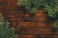 Fir tree twigs on wooden background. Christmas concept Royalty Free Stock Photo