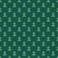 Fir-trees on green background. Forest ornament. seamless winter pattern with spruce Royalty Free Stock Photo