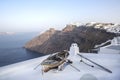 Fira panoramic view. Thira panoramic sea view. Greece Santorini island in Cyclades. Old boat on a terrace with view over Caldera, Royalty Free Stock Photo