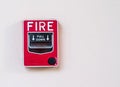 Fire alarm box on cement wall for warning Royalty Free Stock Photo