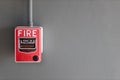 fire alarm box on cement wall for warning and security system in the condominium place. standard safety in the resident, shopping Royalty Free Stock Photo