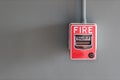 Fire alarm box on cement wall for warning and security system in the condominium place. standard safety in the resident, shopping Royalty Free Stock Photo