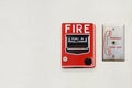 Fire Alarm Notifier and Fireman's Phone Jack on White Cement Plaster Wall with Copy Space for Security Concept Royalty Free Stock Photo