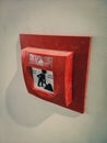 Fire alarm pushbutton in office building