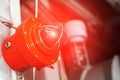 Fire alarm with red warning light of an emergency beacon at an industrial facility Royalty Free Stock Photo