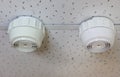 Fire alarm, smoke detector and pendent fire sprinkler on a ceiling Royalty Free Stock Photo