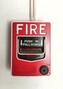fire alarm switch on cement wall Royalty Free Stock Photo