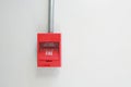 Fire alarm switch on white cement wall Royalty Free Stock Photo